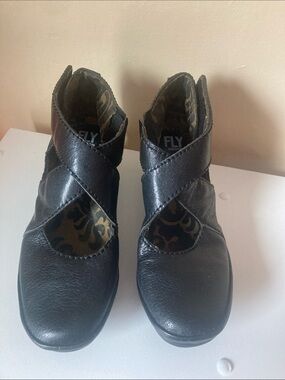 Fly London Black Leather Crossover Strap Wedges